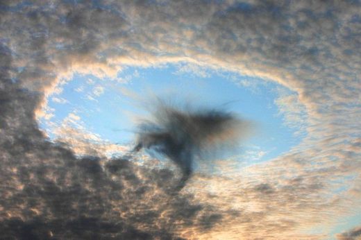 NASA hole punch clouds