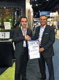 GENCI CTO Stephane Requena accepting the award from Tom Tabor