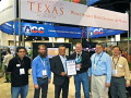 Tom Tabor presenting the Top Supercomputing Award to TACC Director Jay Boisseau and team