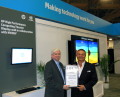 Ed Turkel, WW HPC Marketing at HP accepts award from Tom Tabor, CEO and Founder, Tabor Communications Inc. and HPCwire.