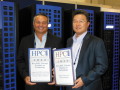 HPCwire and TCI CEO and Founder Tom Tabor presenting Daniel Kim, President & CEO, Appro International, Inc. their award
