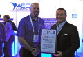 Aeon Computing Co-Founder Doug Johnson accepting the award from Tom Tabor, CEO and Founder, HPCwire and Tabor Communications Inc