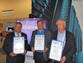 TCI and HPCwire CEO and Founder Tom Tabor presenting the awards to Adaptive CEO Rob Clyde and Beppe Ugolotti, CEO NICEsrl