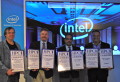 Eric Barton, Lead Architect, High Performance Data Division, Joe Curley, Director of Marketing, Data Center Gp, Raj Hazra, VP Intel Architecture Gp, GM, Tech. Gp, accepting their awards from TCI and HPCwire CEO and Founder Tom Tabor