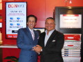 Alex Bouzari, Chairman, Co-Founder and CEO, DataDirect Networks is congratulated by CEO and Founder Tom Tabor, HPCwire and Tabor Communications Inc.