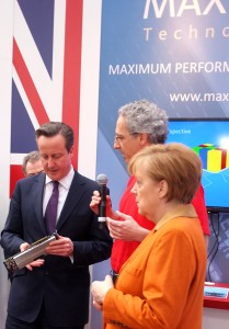 David Cameron and Angela Merkel examine a Dataflow Engine at the Maxeler CeBIT stand