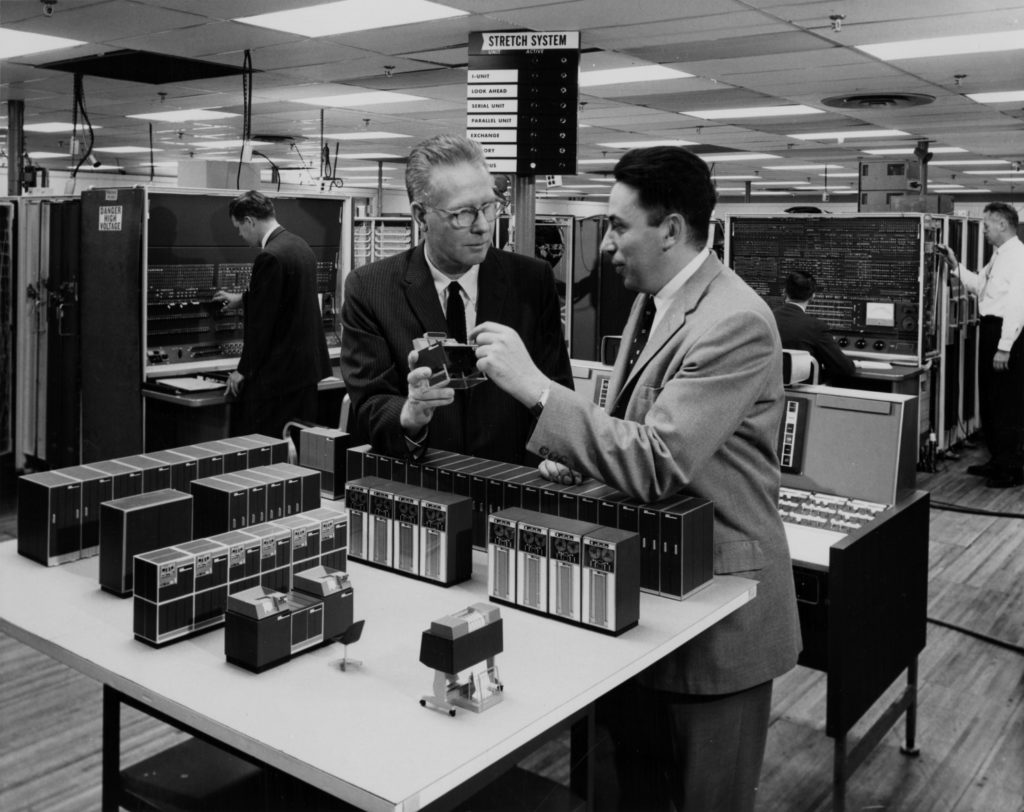 Bloch, right, and a colleague, Steve Dunwell, at work on the Stretch project at IBM. (Courtesy of IBM)